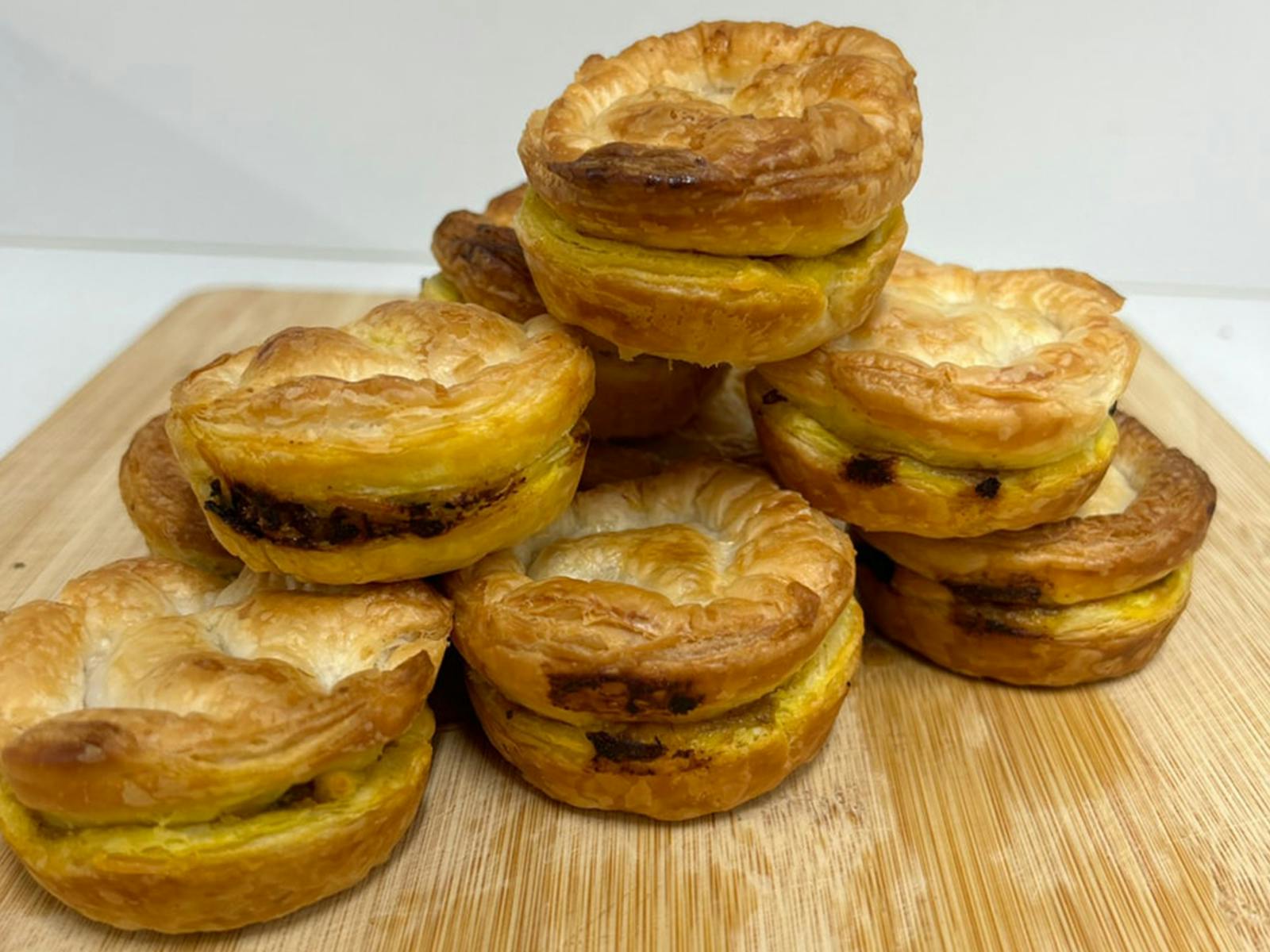 A photo of stacked tarts.
