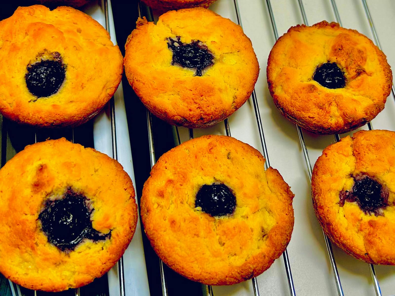 Oven baked muffins with blueberry topped.